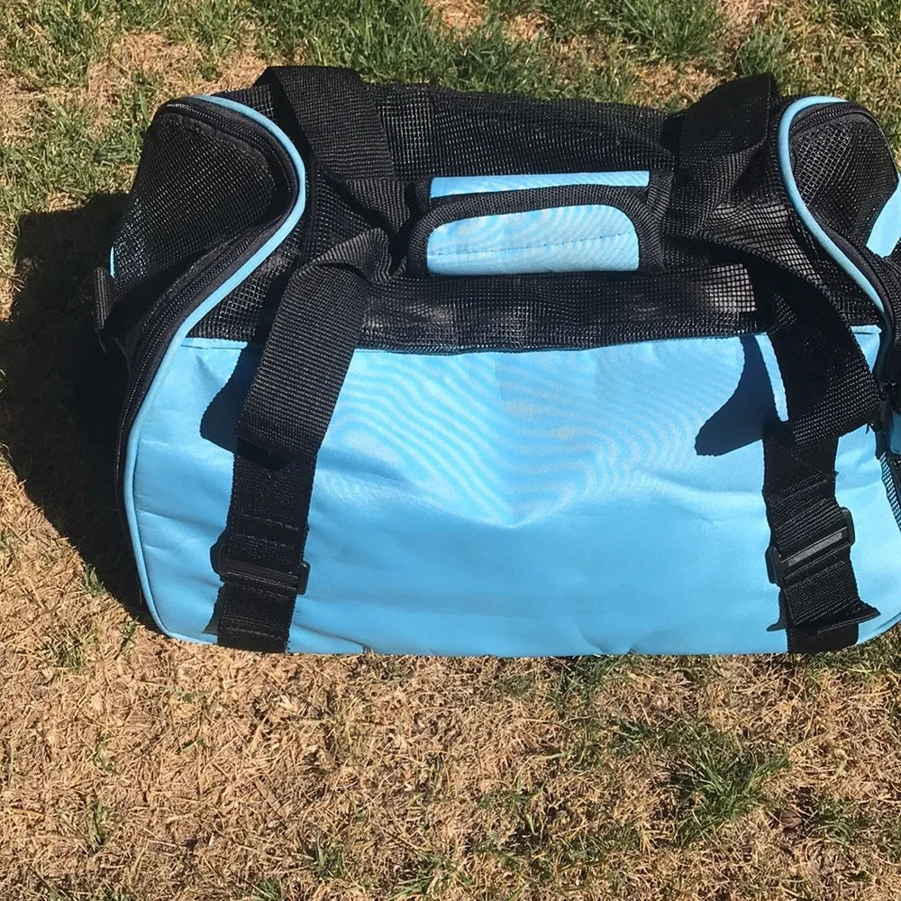 - Pet Carrier with shoulder strap light blue and black well vented used 1x